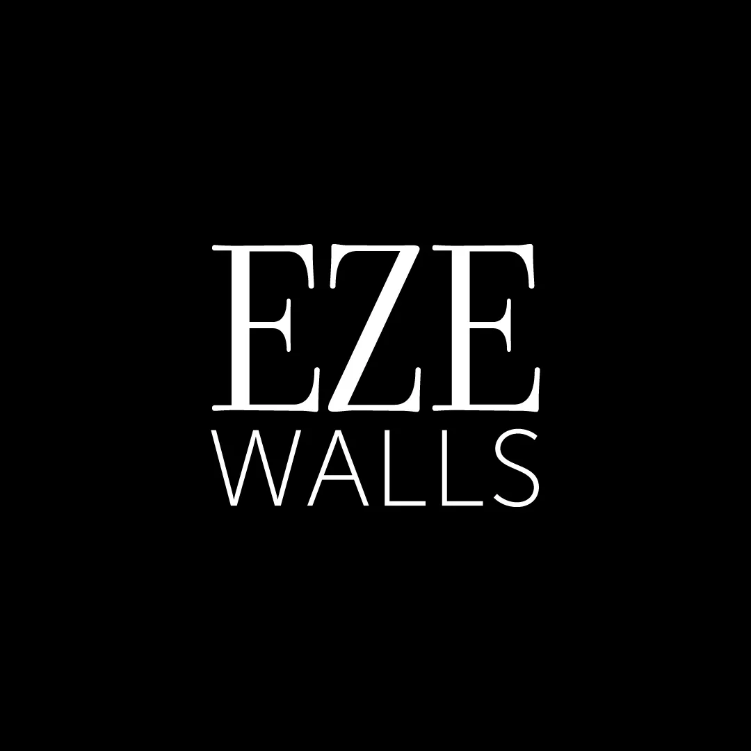 White EZE WALLS text logo on a black background.