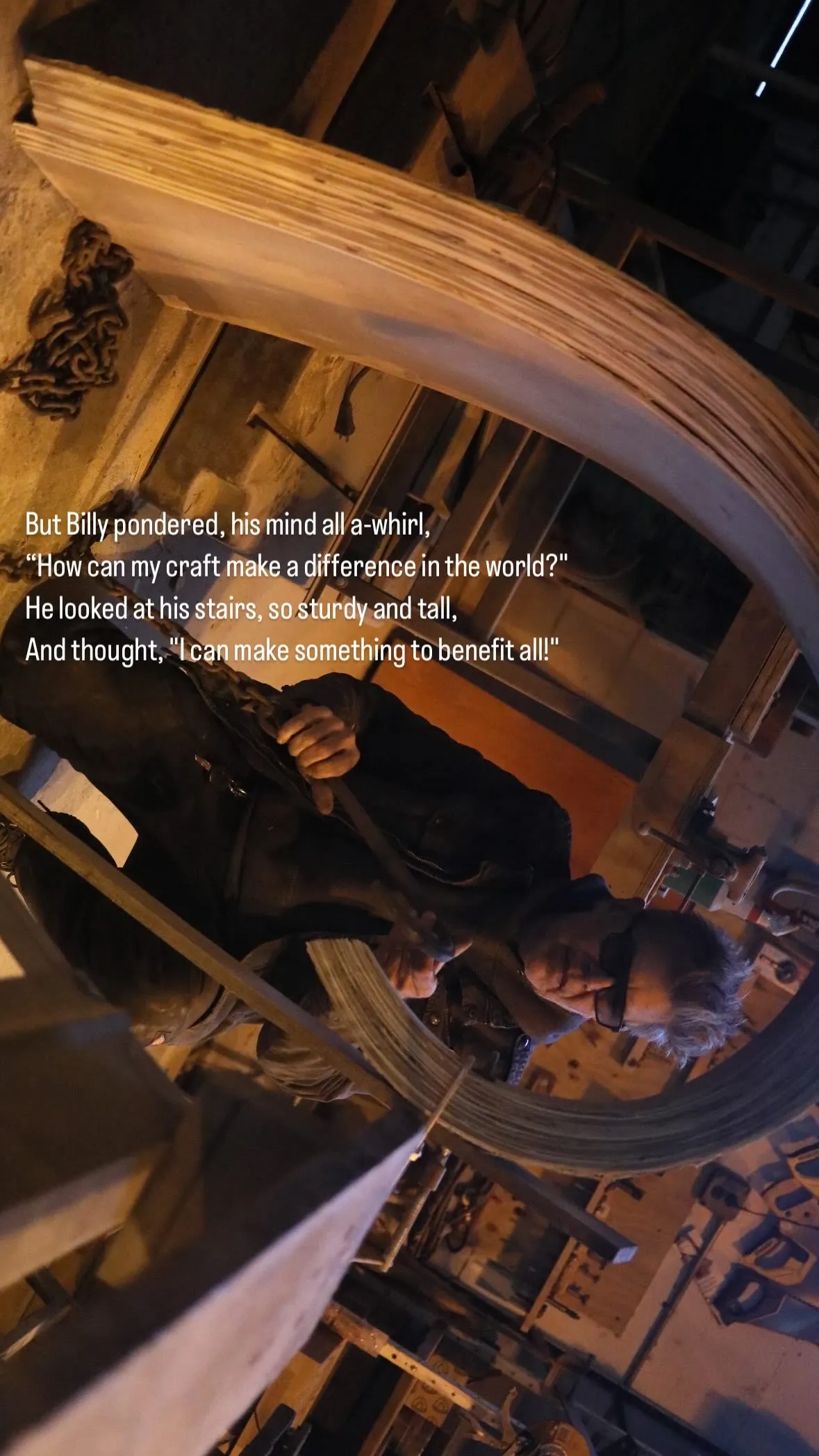Craftsman shaping a tall wooden spiral staircase with tools in a workshop.