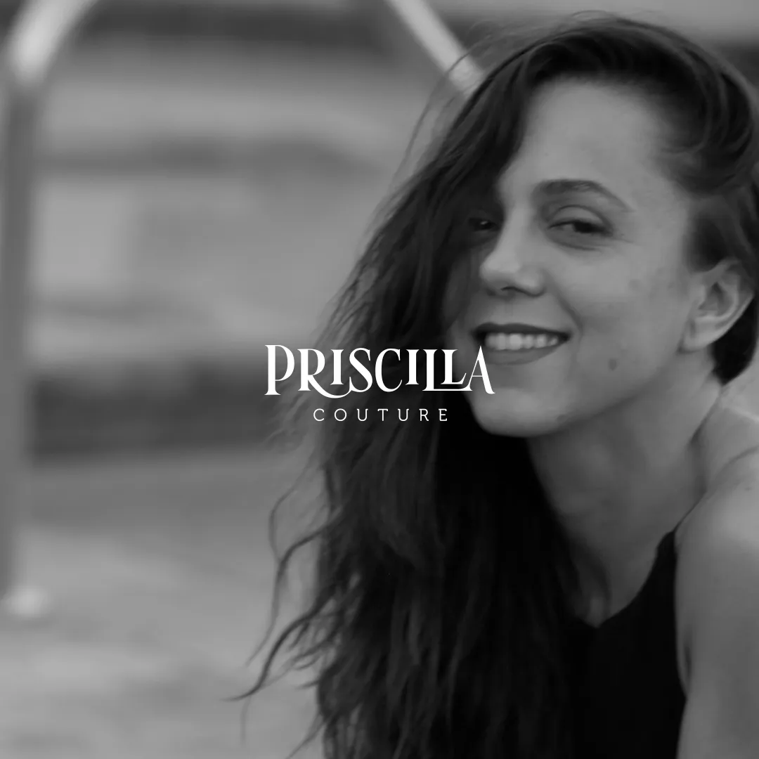 Smiling woman with long dark hair wearing a sleeveless top, black and white photo with Priscilla Couture logo.